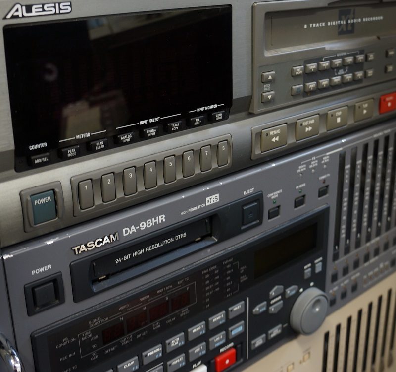 Rack of three digital multi-track machines 