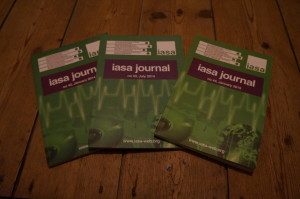 Three IASA journals laid out on the floor