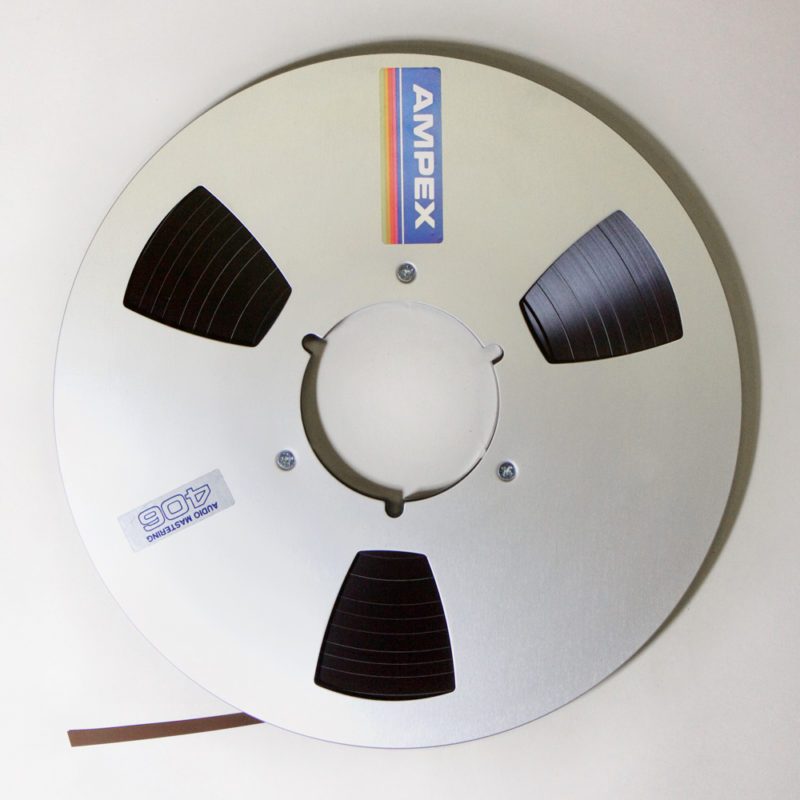 Aluminium Ampex 10.5 inch mastering spool, with quarter inch brown magnetic tape