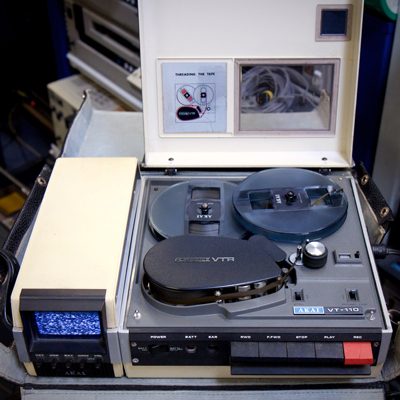 Akai VT-110 video recorder with built in monitor screen and 2 reels of tape