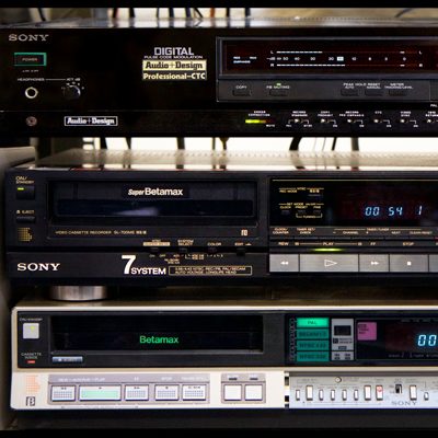 3 rack-based machines. Top labelled: Digital Audio + Design, Professional - CTC. Middle: 7 system. Bottom: Betamax with green PAL button lit