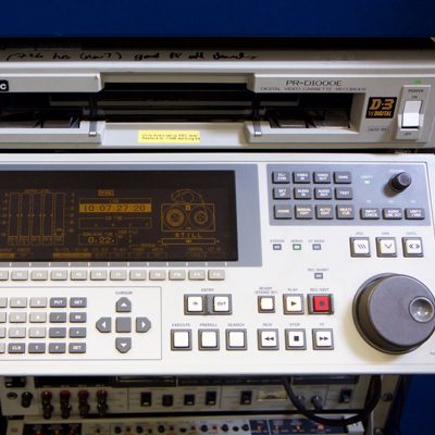 large free-standing cream-coloured D-3 video recorder with multiple buttons and electroluminescent display