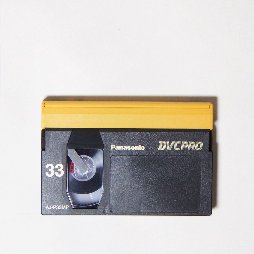 dark grey and yellow rectangular cassette