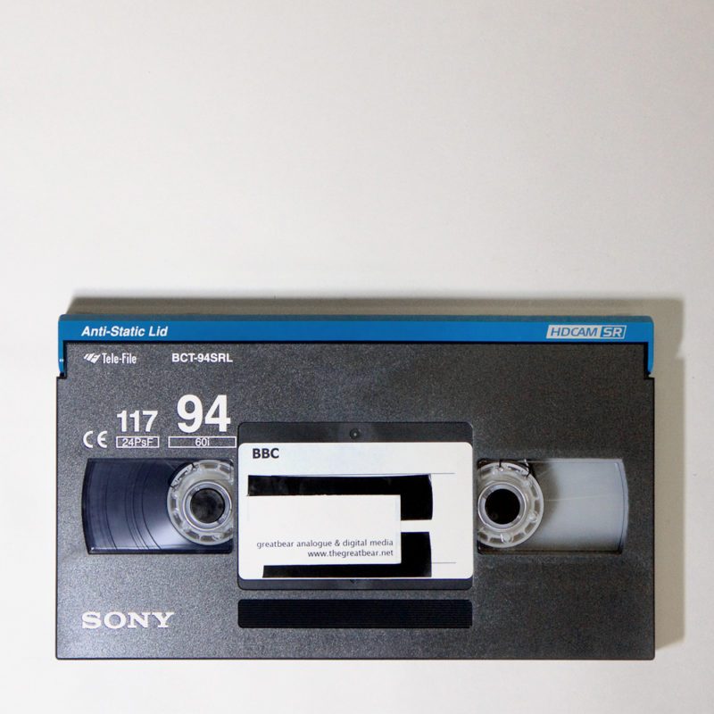 dark grey and blue rectangular HDCAM cassette