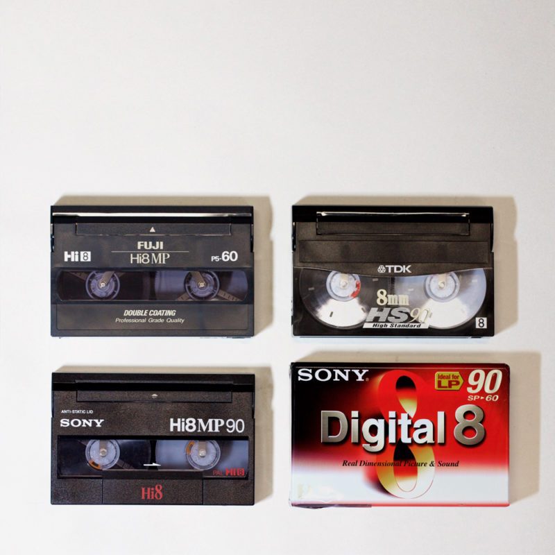 4 rectangular plastic 8mm video cassettes, printed with Hi8, 8mm or Digital8 text