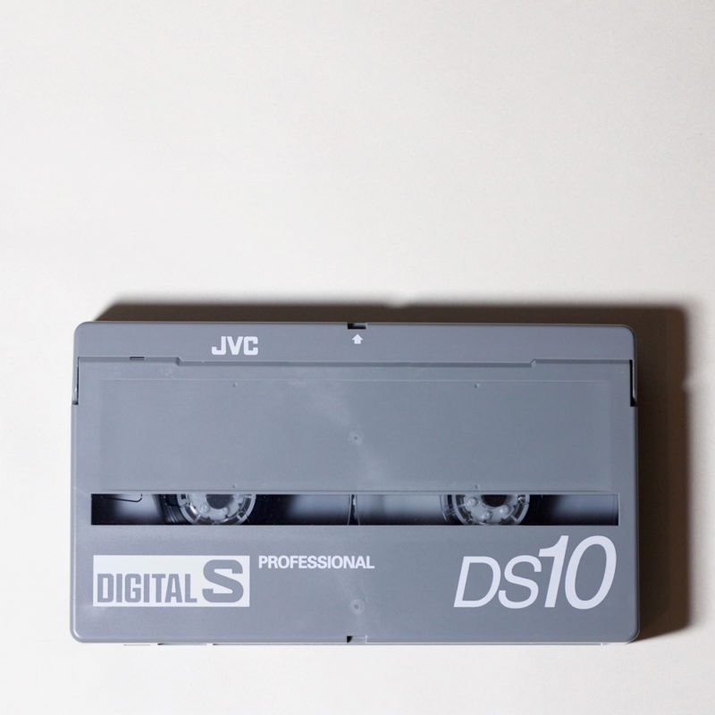 light grey Digital S DS10 video cassette, rectangular with rounded corners