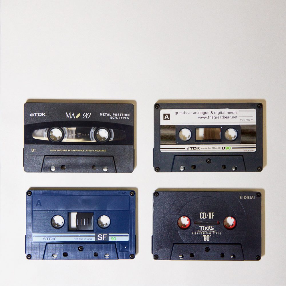 4 different rectangular audio cassettes